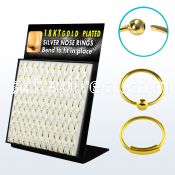brnhmx3 display of gold silver nose hoops with without ball