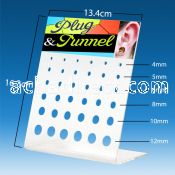 dac46 display of screw fit flared plug flesh tunnel w holes