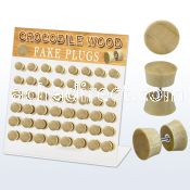 dacb179 display w 48 pcs. of crocodile wood fake plugs