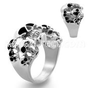 sr257 high polished steel ring with multiple black eyed skulls