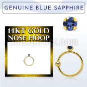 ghge9 14kt gold nose hoop w a 2mm prong set blue sapphire